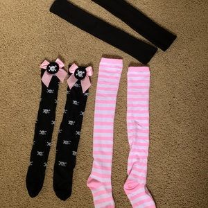 Bundle of thigh high socks and leg warmers